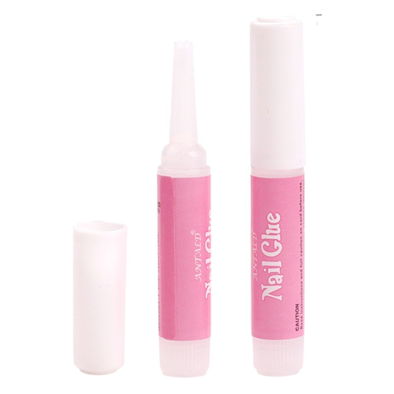 Suministros de uñas transfronterizos botella redonda pegamento de uñas 2G pegamento de uñas con cabeza de cepillo pegamento de uñas no duele pegamento de diamante de joyería de palo de uñas