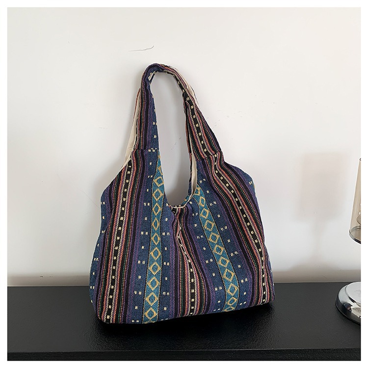 Estilo chino artístico de moda simple bolsa de mujer 2024 invierno nuevo estilo occidental todo partido hombro axila bolsa abierta