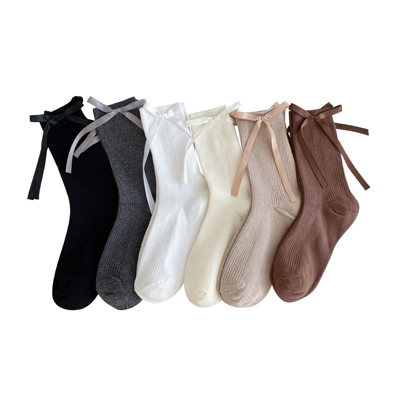 Calcetines de mujer primavera y otoño arco cinta rayas verticales dobles agujas blancas JK Lolitains calcetines de algodón Miu