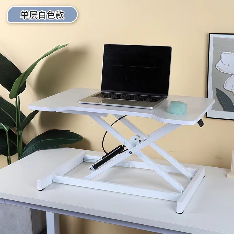 気動机の上のコンピュータの机は立式の事務室の台の上に立って高くなるノートの折り畳みの机で机を昇降することができます。|undefined