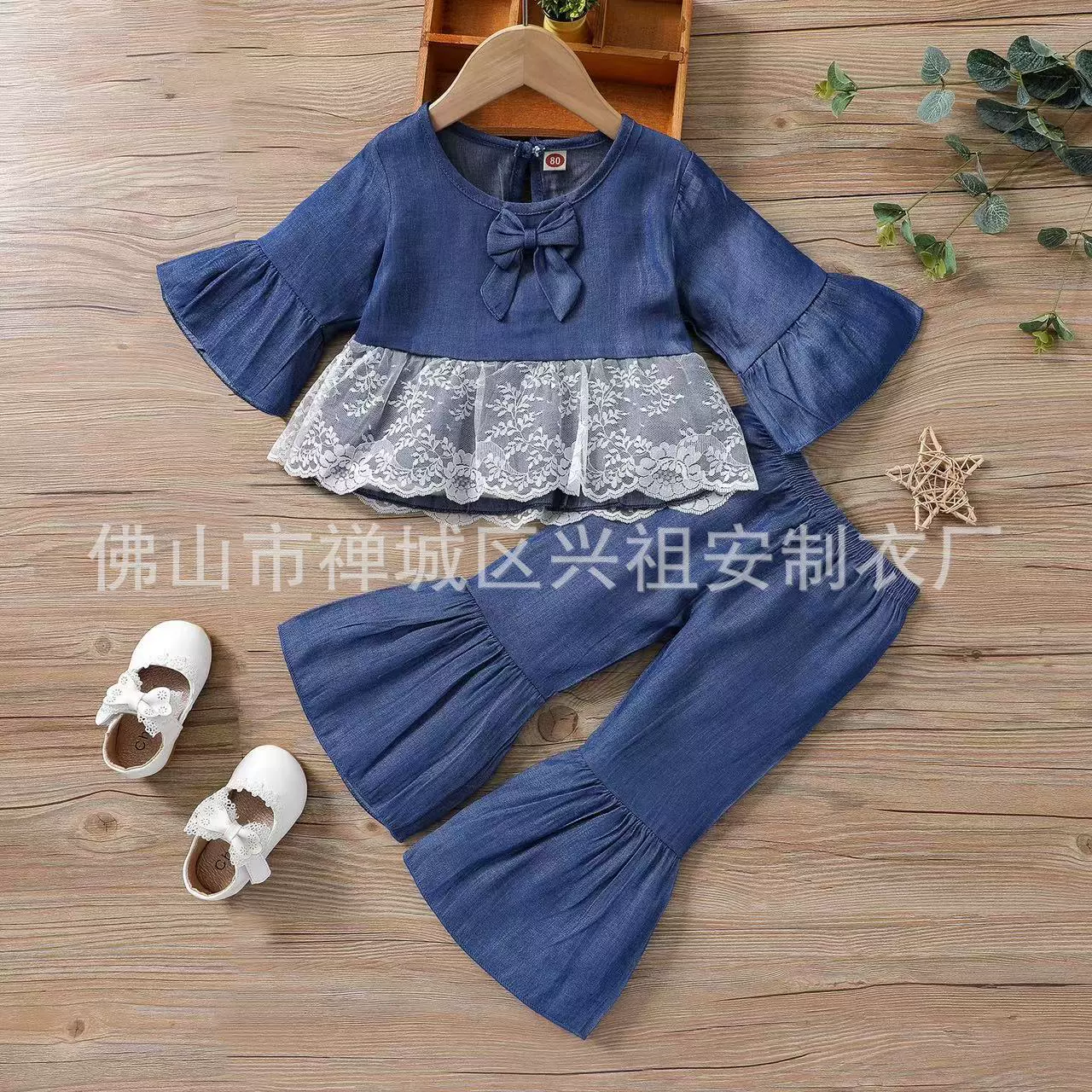 Doll with bow, lace blue flared trousers