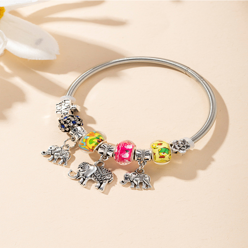 Panjia pulsera Dora DIY cuentas explosivas transfronterizas colgante de elefante letras de cristal cuentas pétalos pulsera ajustable