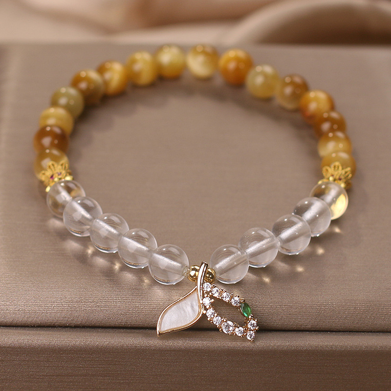 Natural oro tigre ojo piedra pulsera de cristal blanco mujer de alto nivel sensación colgante de cola de pez pulsera ligera lujo nicho joyería de mano