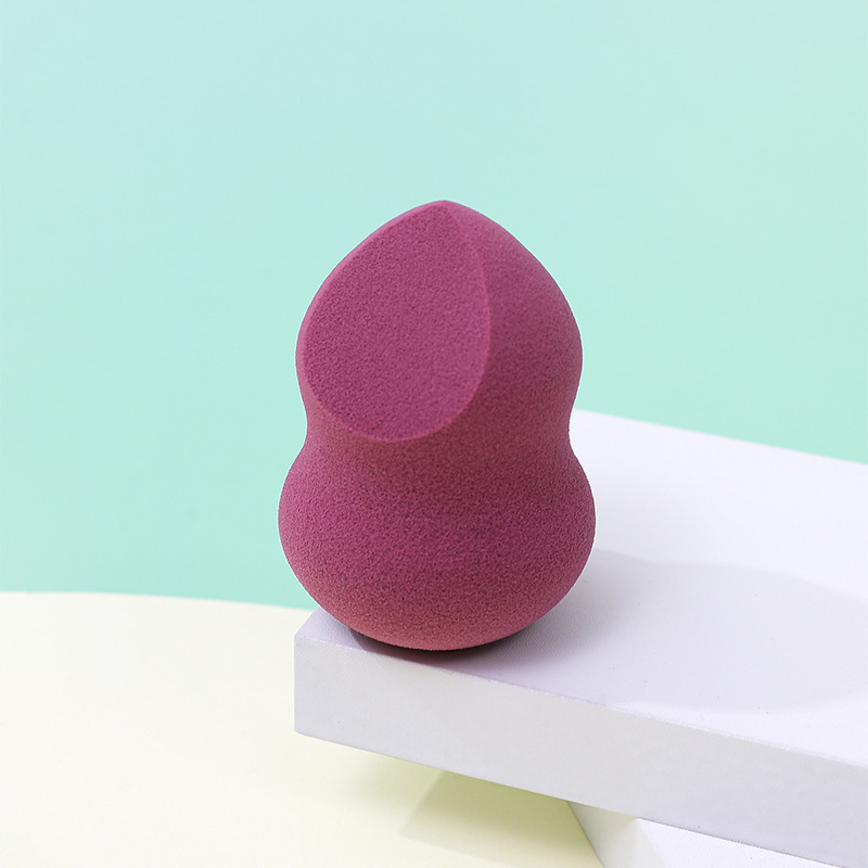 Fábrica personalizada cortar un cuchillo de polvo de maquillaje de huevo no comer polvo en forma de calabaza de poliuretano esponja de maquillaje de huevo de maquillaje