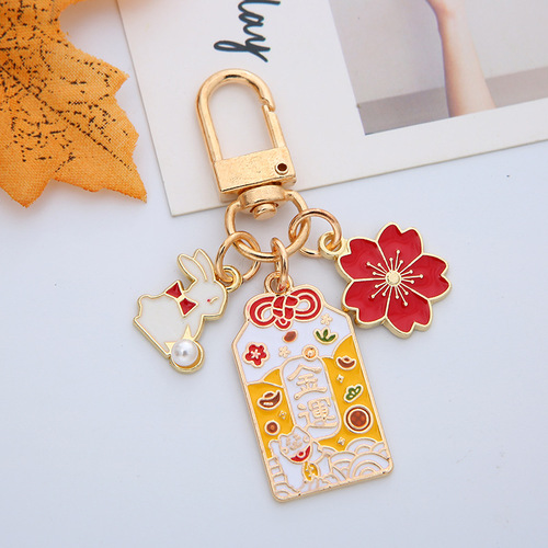 Japanese ins cherry blossom peach blossom royal guard lucky and lucky creative couple keychain pendant couple bag pendant for women