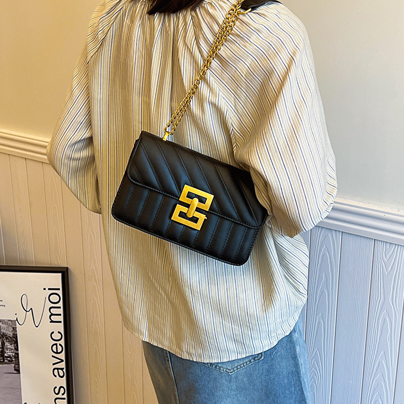 Primavera retro bolsos de mujer 2024 nuevo popular explosivo bolso de cinturón de cadena de moda bolso de hombro