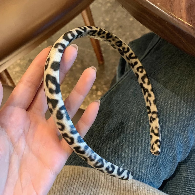 Nuevo estilo coreano de alta calidad estampado de leopardo hermoso banda de tela esponja textura de moda banda de cabeza de cráneo alto accesorios para el cabello