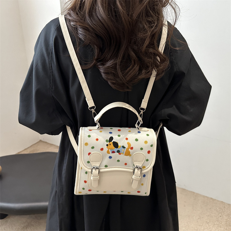 Bolso popular de mujer 2024 nuevo tipo de mochila, mochila de punto de onda, mochila de gran capacidad, mochila multifuncional