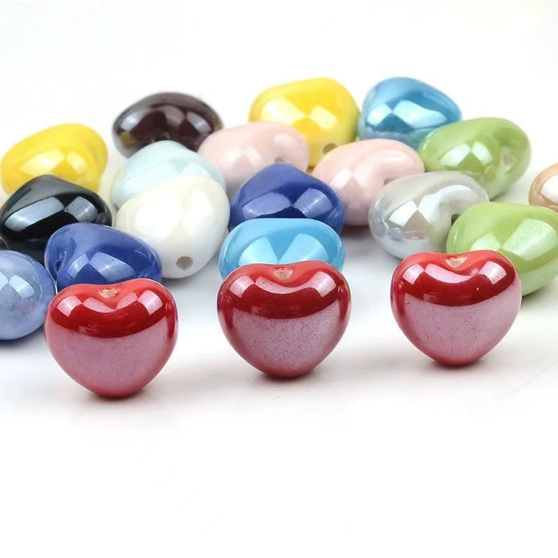 Cuentas de cerámica flor cuadrada estrella de cinco puntas pequeña flor de ciruelo trébol de cuatro hojas pequeño elefante pequeño conejo de jade color mixto cuentas de agujeros rectos cuentas hechas a mano