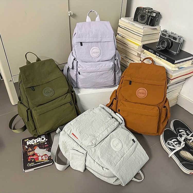 Casual, ligero y de gran capacidad, mochila para niños y niñas, mochila simple de color sólido para estudiantes de primaria, nueva mochila infantil transfronteriza