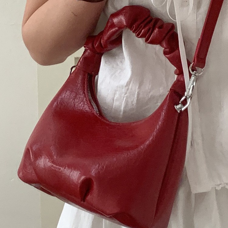 2026 primavera nueva moda temperamento bolso de hombro de moda bolso de arco de moda moda bolso de mano de tendencia diaria plegado mochila