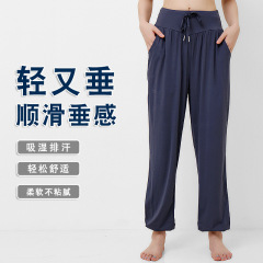 ゆったりとしたスポーツズボンは男女の速乾通気性があります。