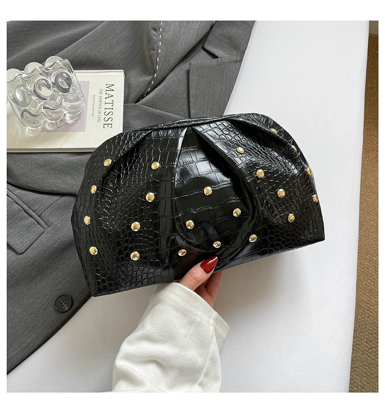 2026 tendencia de primavera nuevo clip de textura simple clavos de hongo de moda de textura plegada bolso de mano mujer