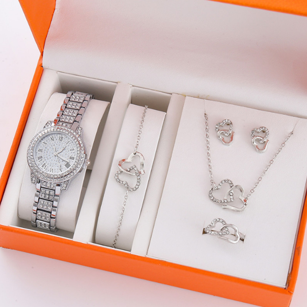 Nuevo producto para mujer 5pcs/set moda de nicho todo fósforo falso traje de reloj de cuarzo con cinturón de acero de tres ojos