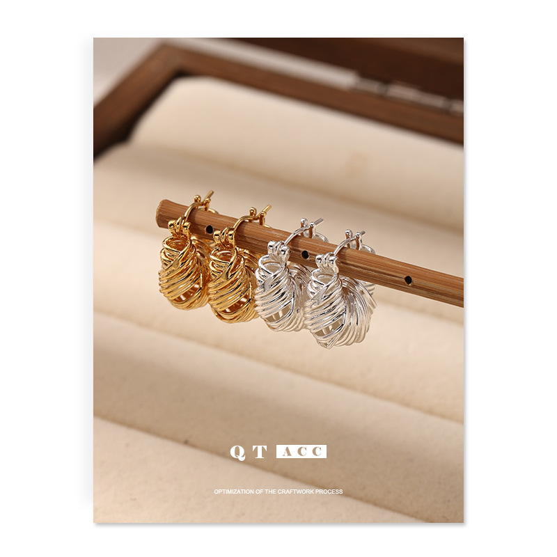Elegante textura de seda de alta sensación de auriculares personalidad simple versátil otoño y invierno nuevo tipo de auriculares de plata esterlina transfronterizos