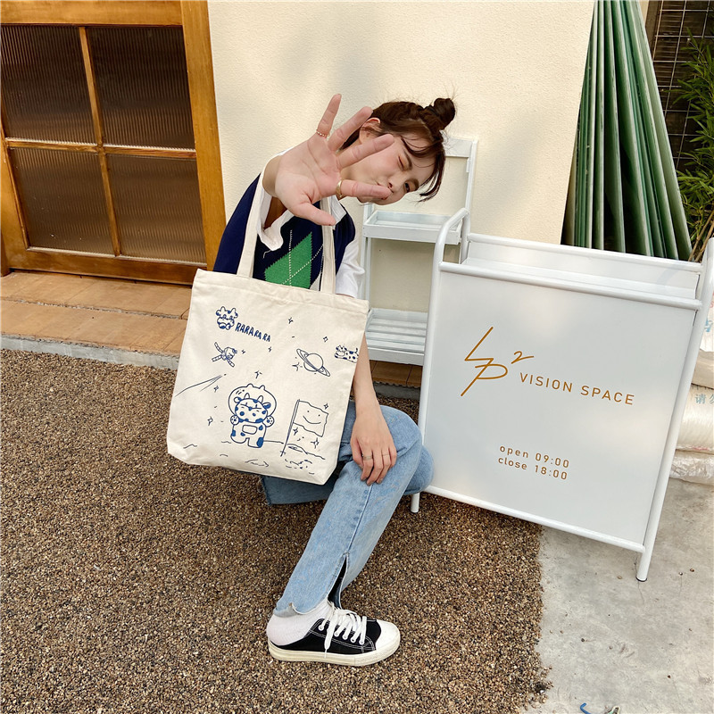 【 In Stock 】13173 Cute Moon Landing Cow single-shoulder Bag, student girls' schoolbag, canvas bag, large capacity wholesale undefined