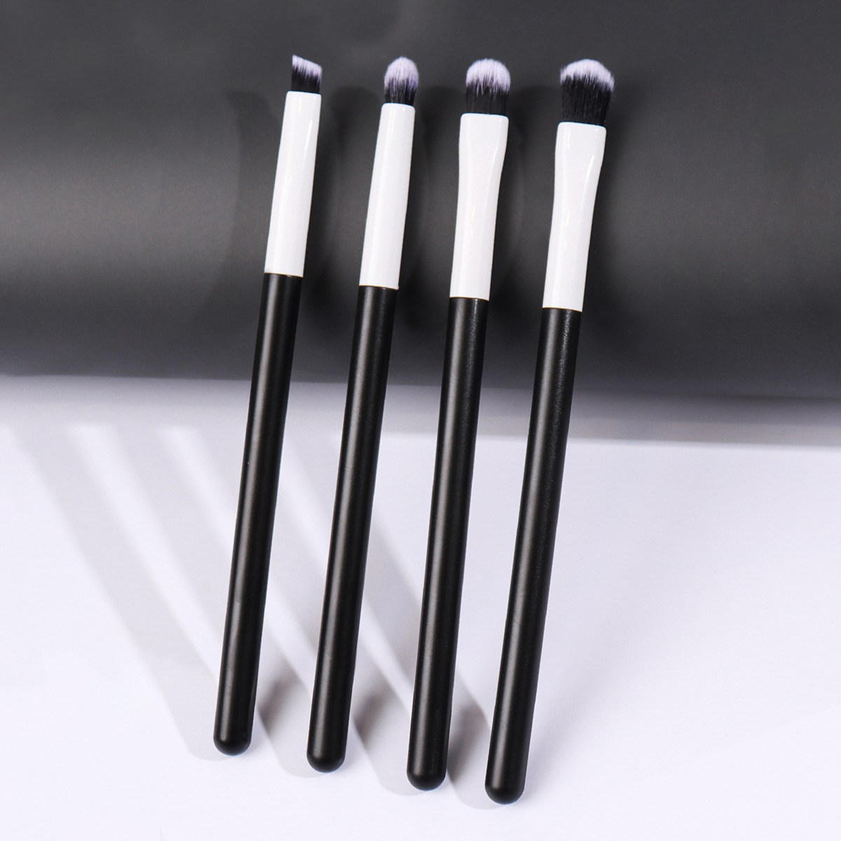 Nuevos productos transfronterizos 4 conjuntos de cepillo de ojos para principiantes cepillo de maquillaje de cabeza redonda cepillo de ceja inclinado