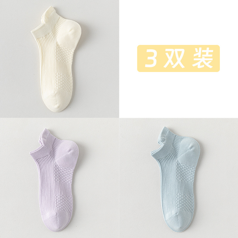 Calcetines de barco para mujeres, calcetines de primavera y verano, calcetines de algodón de color sólido, calcetines de algodón resistentes a las bolas, calcetines de embalaje independientes sin costuras.