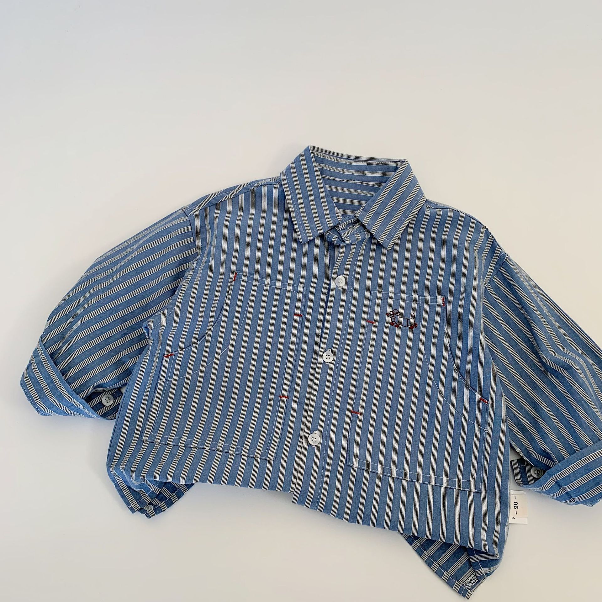 Camisas infantiles Mai Bao 2025 otoño chaqueta retro de estilo extranjero para niños nuevos productos coreanos camisa universal