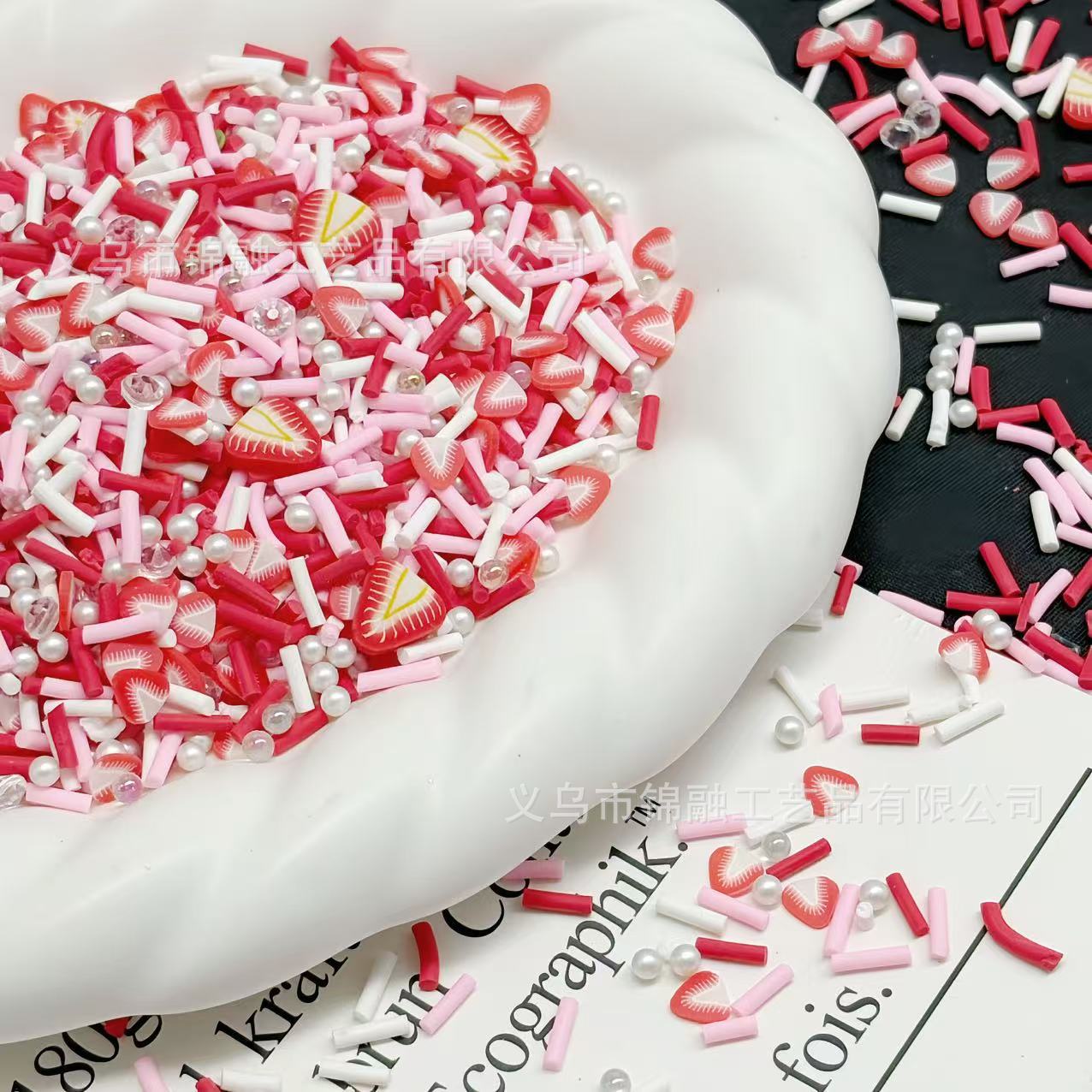 Red strawberry mixed with soft clay slices