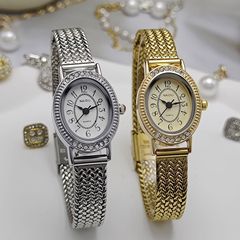 中古の小さなゴールド時計メーカー卸売人気のミニエレガントな楕円形のプレートの女性のレトロなスチールバンドの女性用腕時計