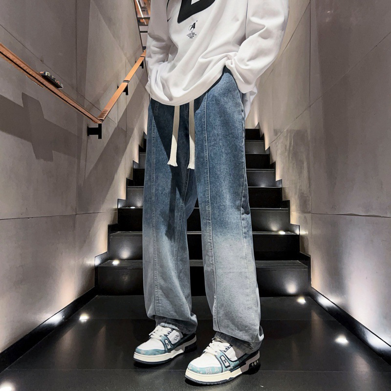 Una marca de moda de Hong Kong jeans para hombres otoño y invierno nuevos pantalones de pierna ancha gradiente al por mayor jeans para hombres