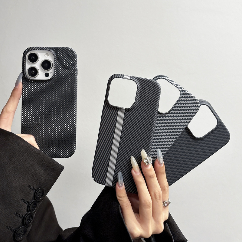 Suitable for Apple 17Promax Large Hole Water-Resistant Kevlar Carbon Fiber Pattern Iphone16 All-Inclusive Anti-Fall Phone Case Suitable for Apple 17Promax Large Hole Water-Resistant Kevlar Carbon Fiber Pattern Iphone16 All-Inclusive Anti-Fall Phone Case