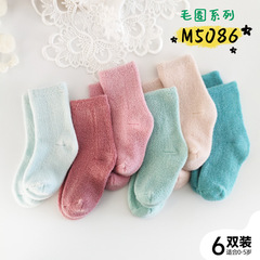 冬の厚手の保温純色の靴下は赤ちゃんの子供の靴下を卸売りします。
