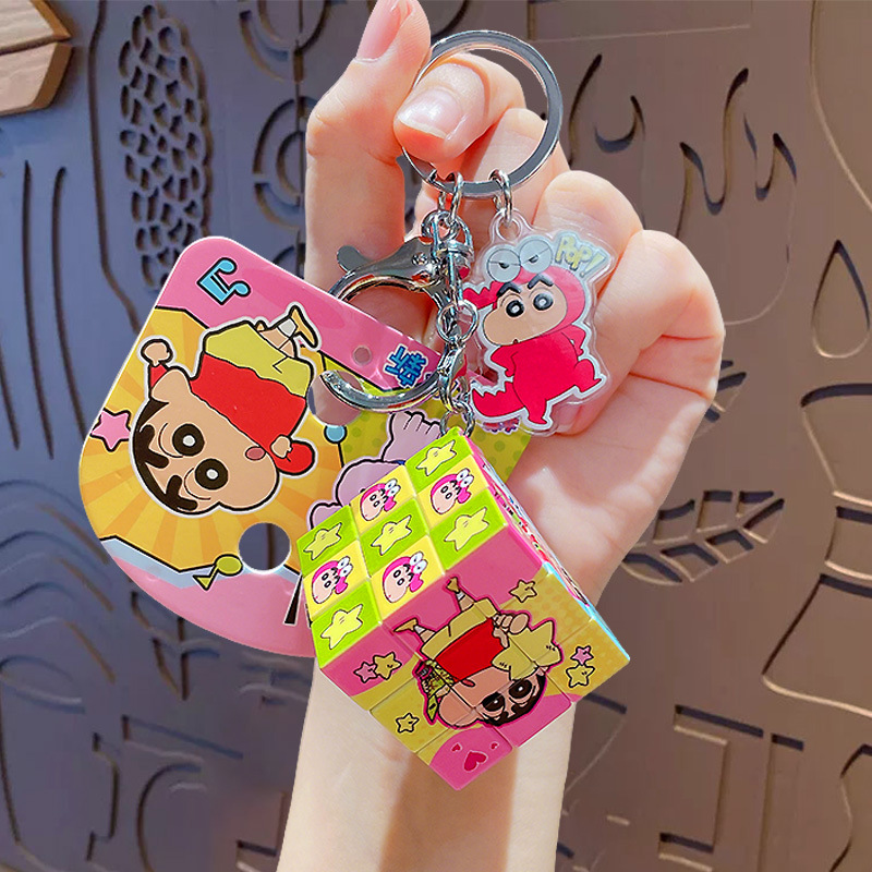 Crayons, Rubik's cube, keychain, crocodile