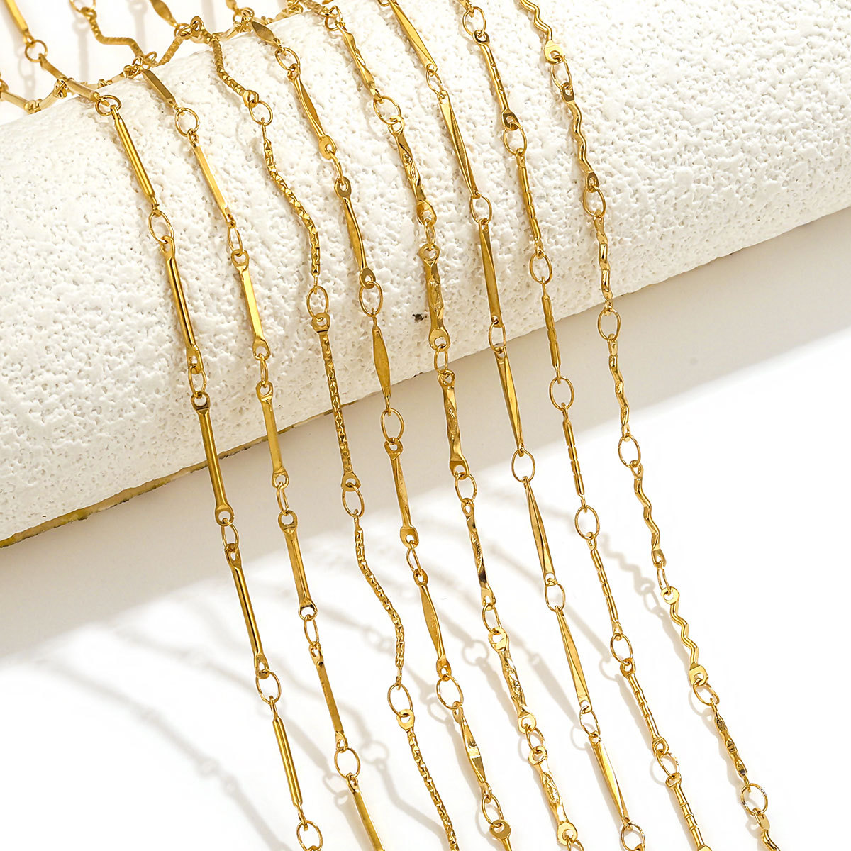 Accesorios de cadena de acero de titanio acero inoxidable galvanizado 18K oro palo S cadena no se desvanece en joyas de viento