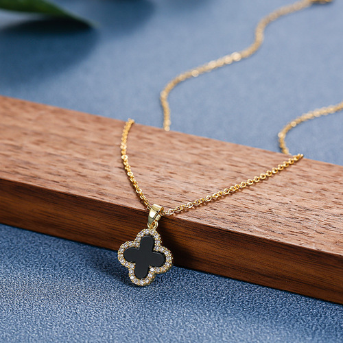 Titanium steel necklace women's 18k rose gold diamond four-leaf clover pendant niche light luxury black shell clavicle chain temperament neck necklace