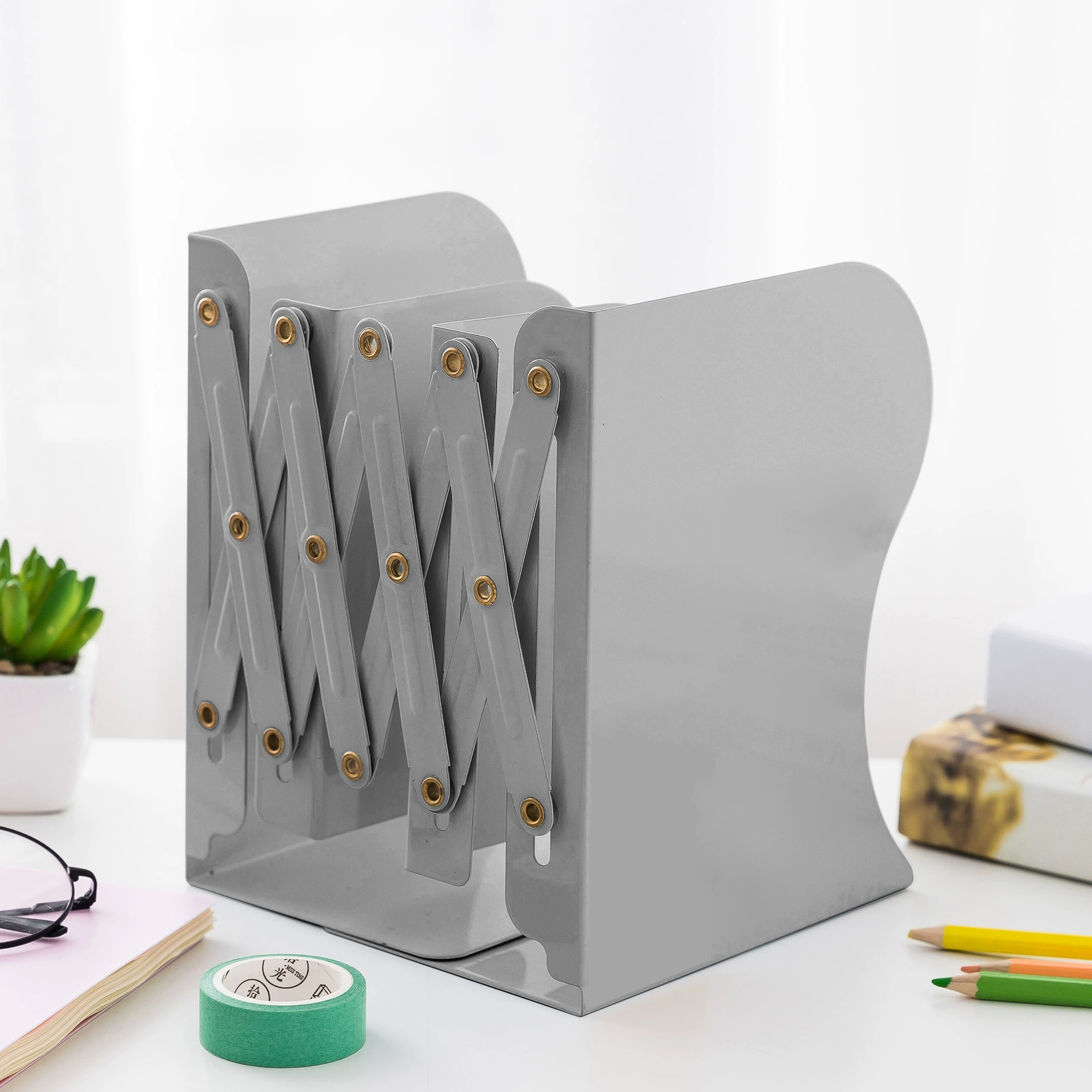 Factory direct sales explosion creative stationery supplies telescopic book holder folding book frame metal students cartoon