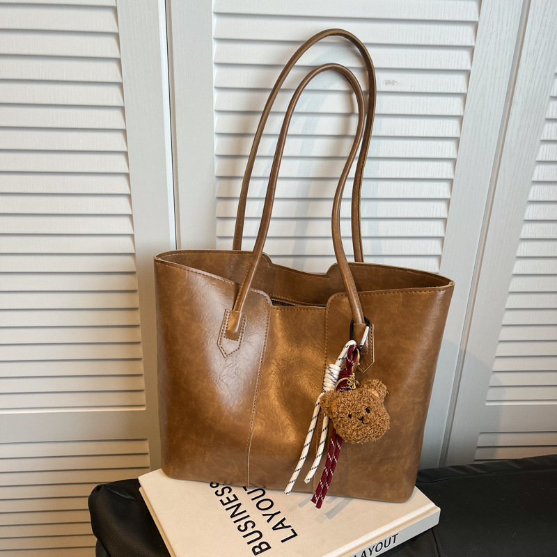 Bolso de gran capacidad de viajero de temperamento de alta gama para mujer 2024 nuevo otoño e invierno bolso de hombro de lujo ligero bolso de ocio