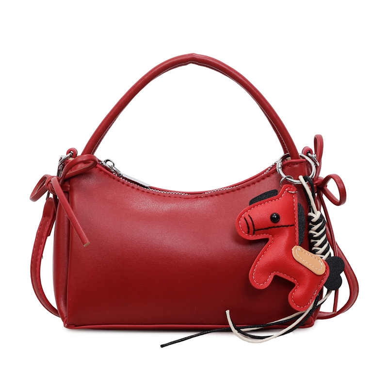 Meilade viento suave cuero brazo bolso para mujeres 2026 nuevo estilo de moda de viaje bolso de hombro sensación diaria simple mochila