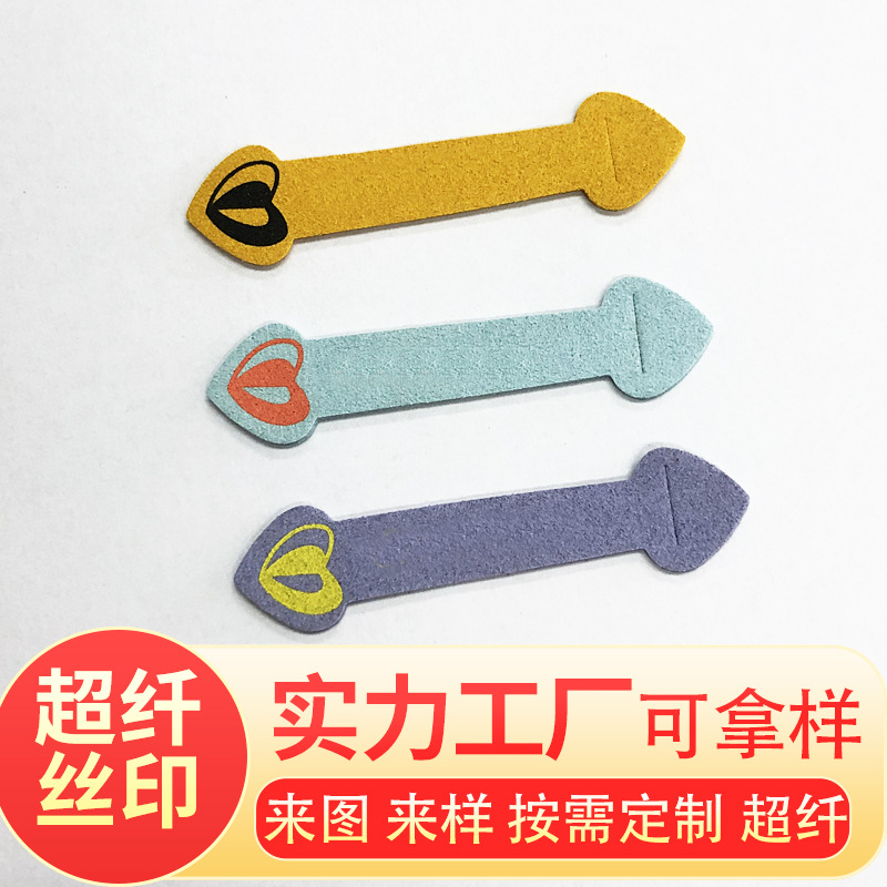 优选供应贴膜超纤皮革打金属鸡眼皮标压花皮牌服装商标绒面超纤皮