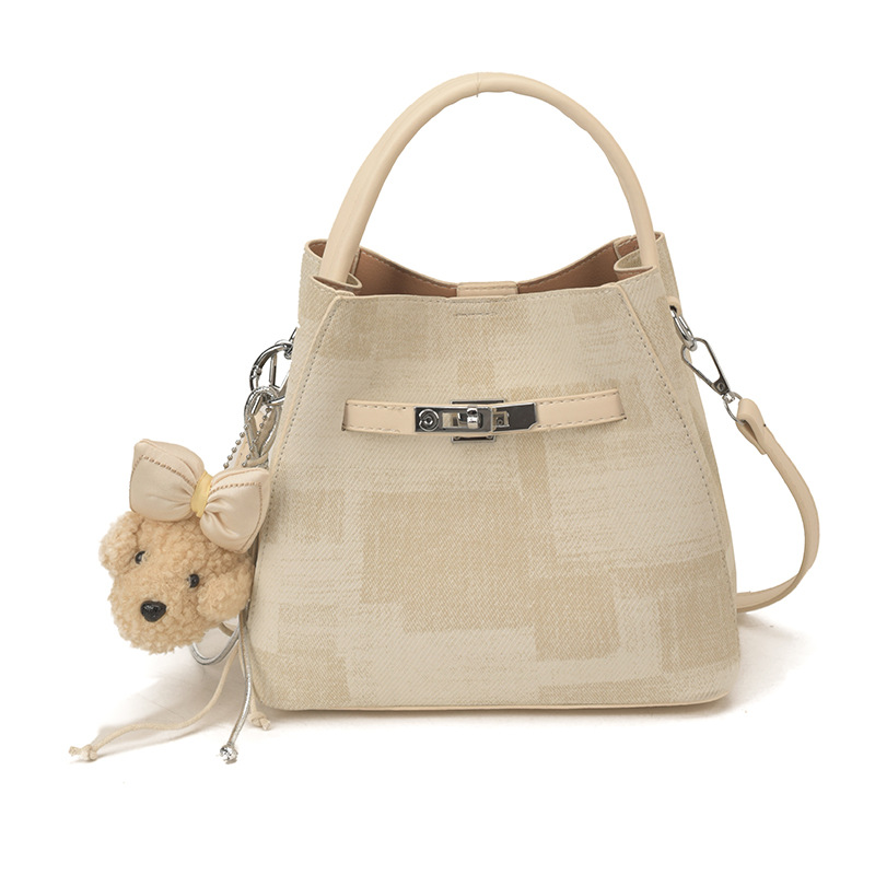 Comercio exterior transfronterizo coreano simple nicho de diseño de moda bolso de cubo para mujeres 2026 nuevo tipo de mujer mochila de hombro