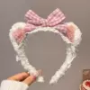 Bow tie, fuchsia headband, 5578 cells