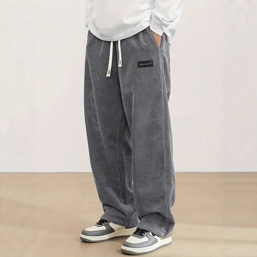 European-size men's autumn new comfortable long pants, loose-fit casual pants made of logo corduroy fabric.