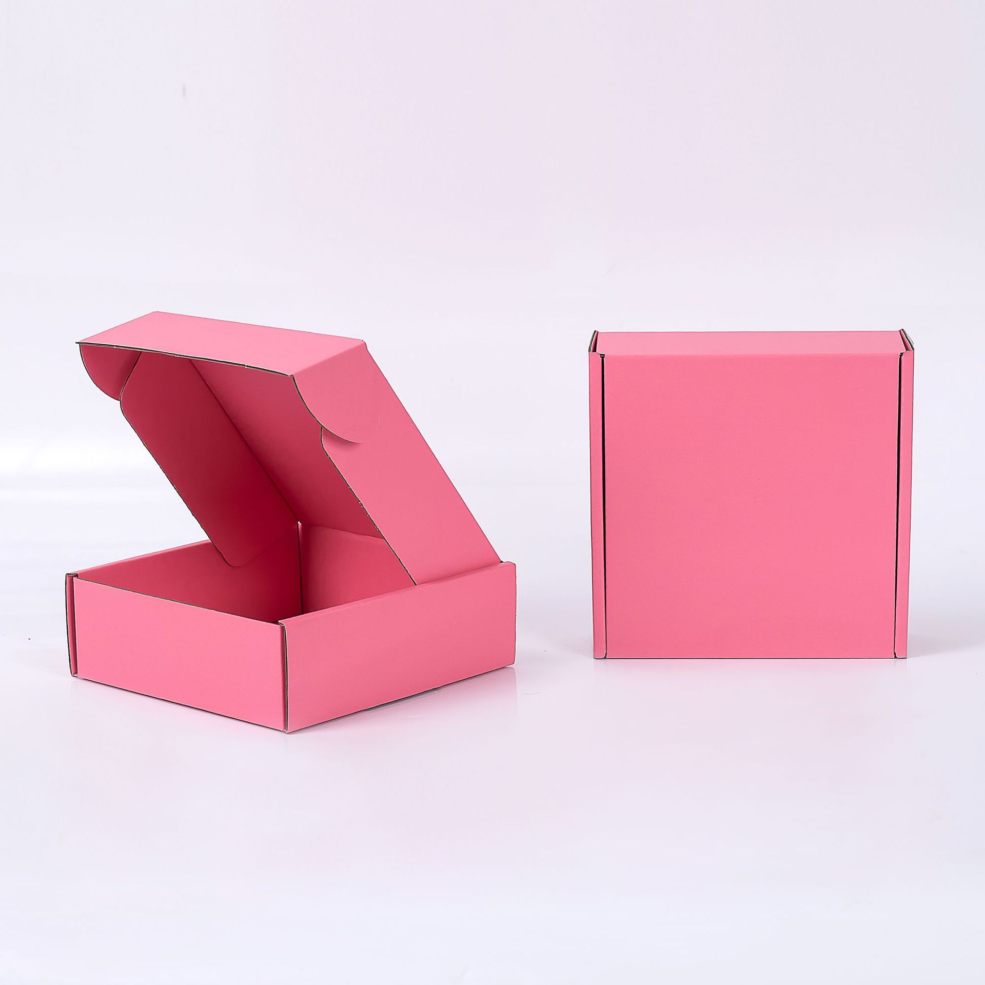 Xinfeng girl rosado caja de avión spot venta al por mayor caja de avión de color extra duro embalaje de ropa caja de avión rosa