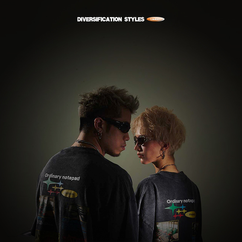 LawFoo primavera y verano marca de moda Nacional Americana Retro lavado viejo grande impreso fuera del hombro versión suelta pareja camiseta moda