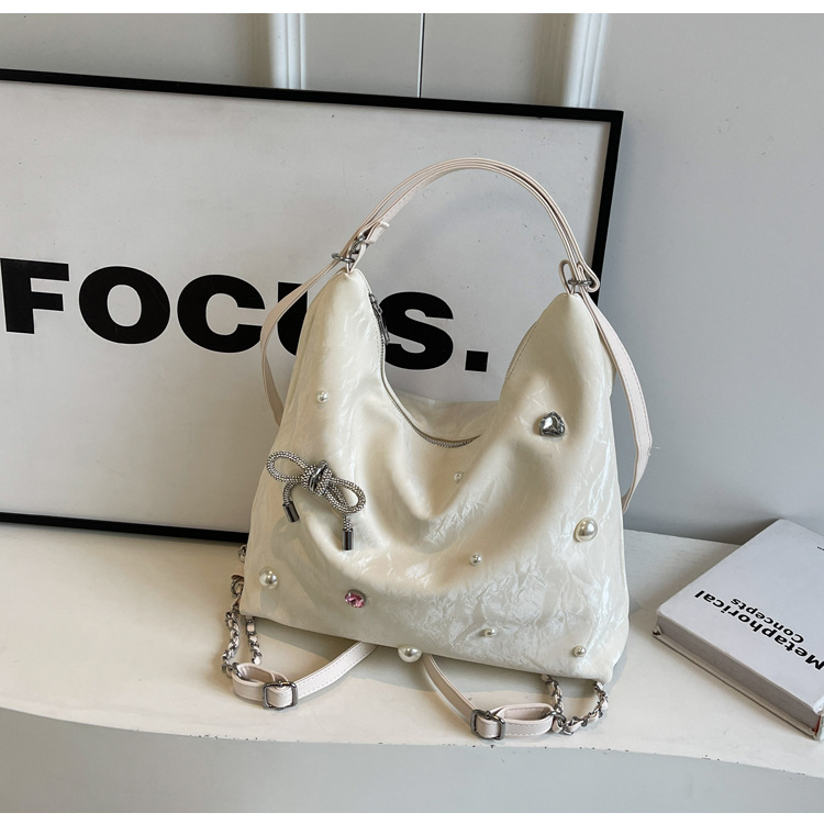 Bolsa de gran capacidad para mujeres 2024 nuevo nicho de alto nivel de diseño de diamantes de viaje multifuncional mochila de doble hombro inclinada