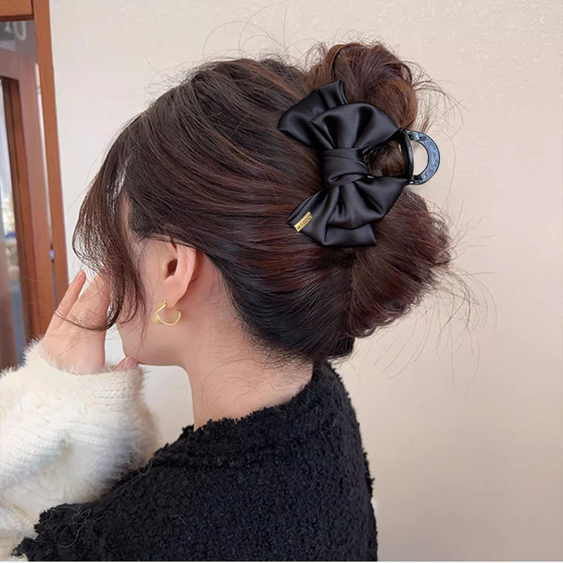 Oro negro etiqueta abrazadera de arco para mujeres nuevo estilo de alta sensibilidad abrazadera de cabello detrás del cerebro abrazadera de cabello de pesca abrazadera de cabello