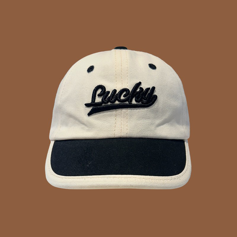 Sombrero de bebé primavera y otoño letras extranjeras sombrero de lengua de pato para niños otoño y invierno caliente sombrero de sol bebé marea de béisbol