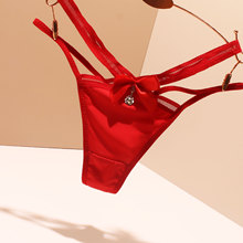 欧美性感内裤女诱惑冰丝无痕纯色女生可爱蝴蝶结镂空细带丁字裤女