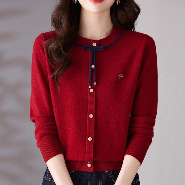 Autumn knitted cardigan with a round collar