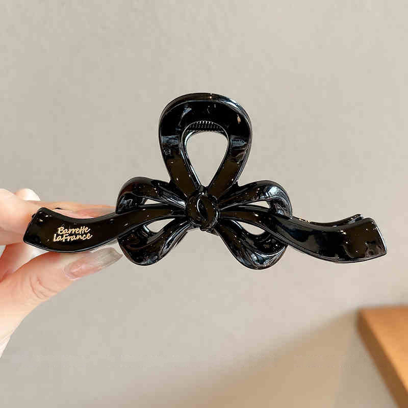 Temperamento arco flotante clip para el cabello de mujer cantidad de diseño de clip de tiburón tarjeta de cabello detrás de la cabeza agarrar clip para el cabello