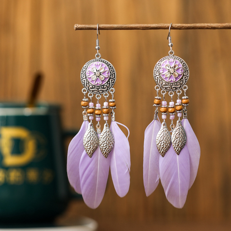 Yiwu Jewelry Daisy Round Painted Oil Long Tassel Earrings Women's White Feather Earrings European and American Earrings Commodities