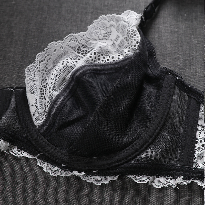 Estilo francés europeo y americano Ropa Interior Negra traje de encaje color a juego de las mujeres sujetador anillo de acero sujetador sexy puro deseo sujetador traje