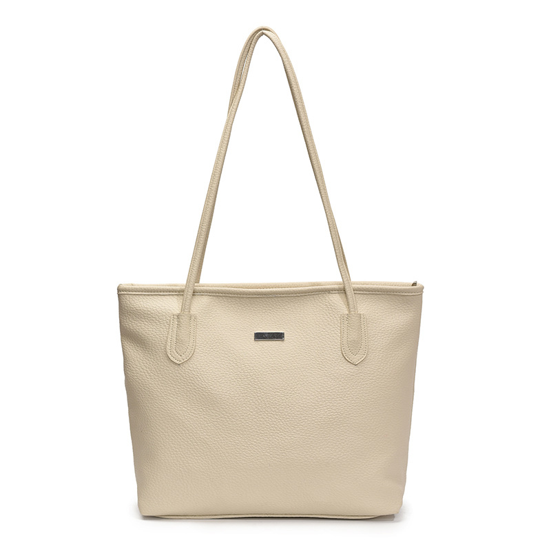 Nuevo bolso de gran capacidad de primavera en 2025 Bolso de hombro de color sólido casual popular de este año Bolso de mujer Tote de axila de estilo occidental