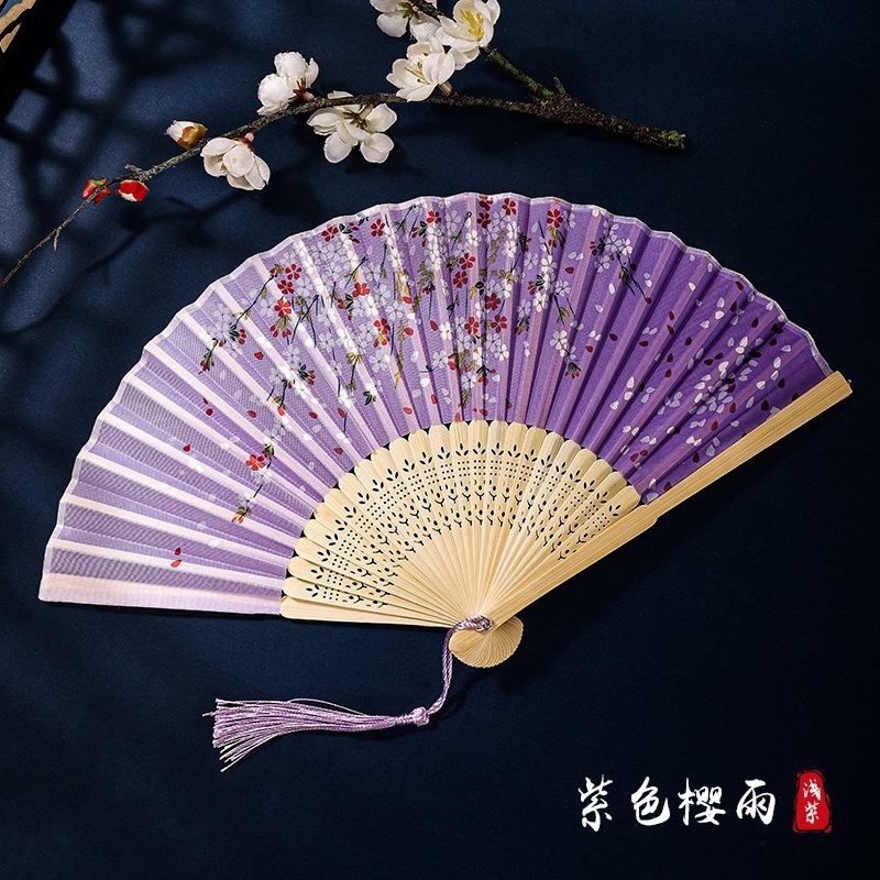 古代のチャイナドレスの女性の漢服の子供のダンスの桜の扇の中国風の夏は桃の花の扇子を身につけて古風を扇に折ります。|undefined